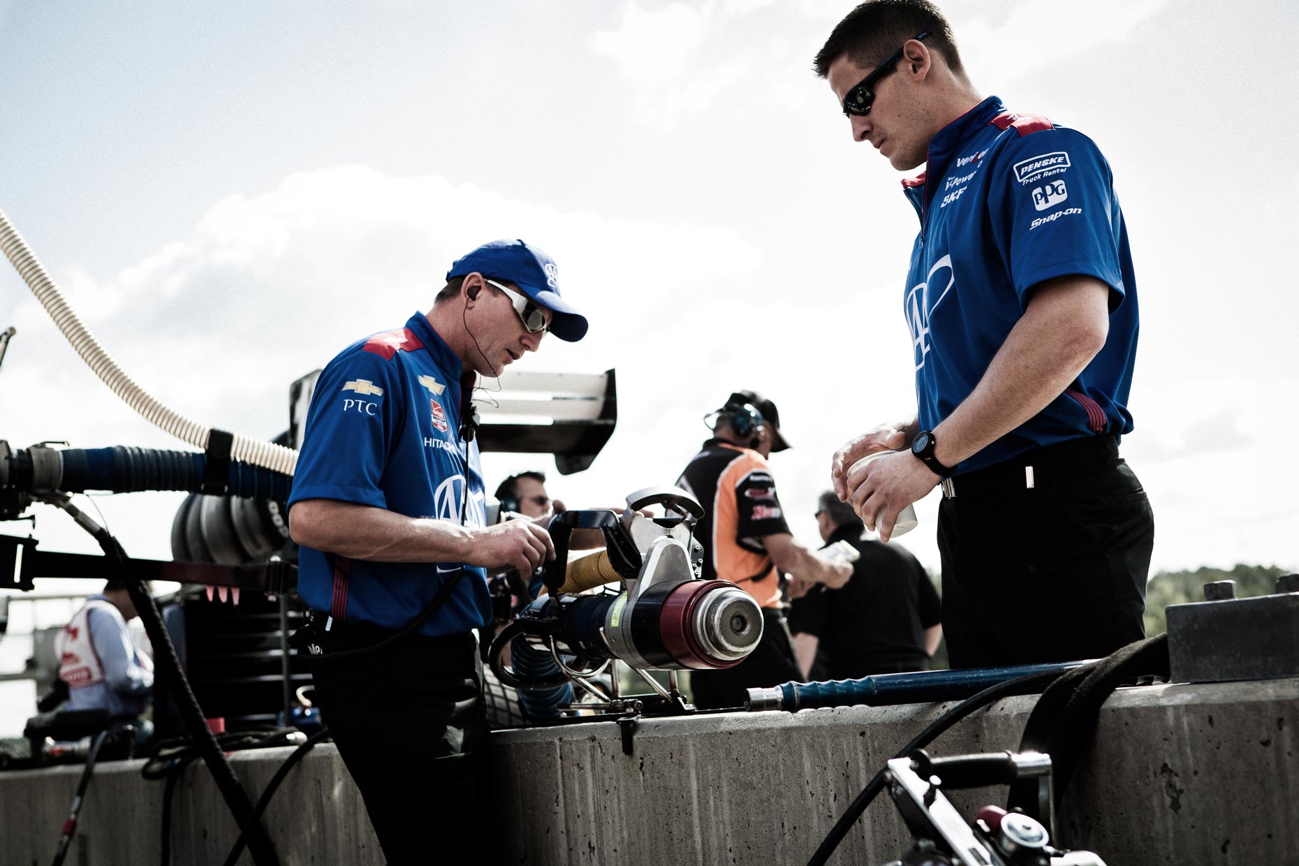 Team Penske checking fuel nozzle.
